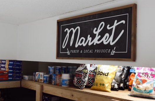 The Market shelf at the Hope Center stocked with food items